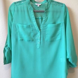 Candie’s polyester mint blouse with lace back